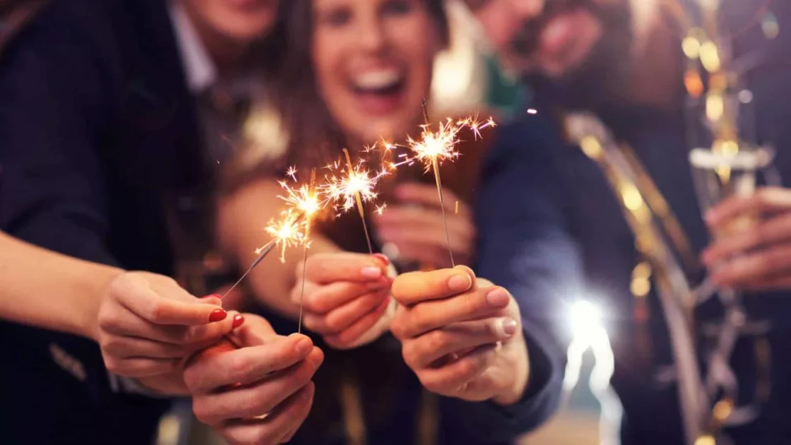 Picture,Showing,Group,Of,Friends,Having,Fun,With,Sparklers