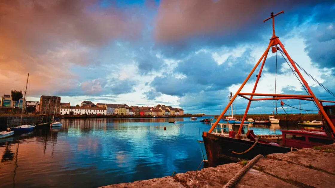 Fishing,Boat,At,Sunset.,Corrib,River.,Galway,City.,County,Galway.