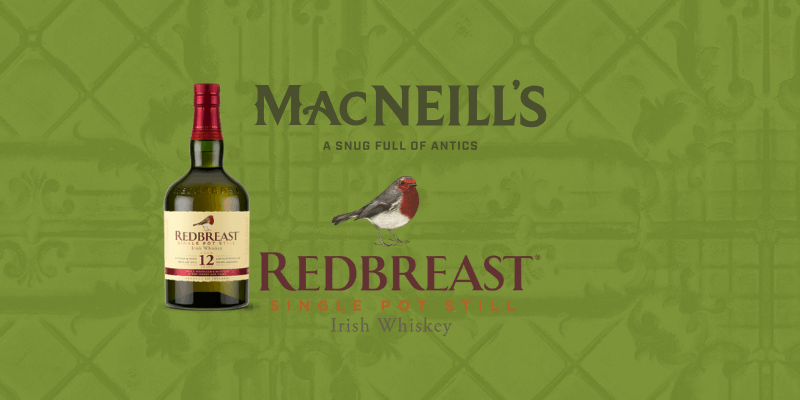 A bottle of Redbreast 12 Year Old Irish Whiskey is shown on a green patterned background with a redbreast bird and text promoting MacNeill's.