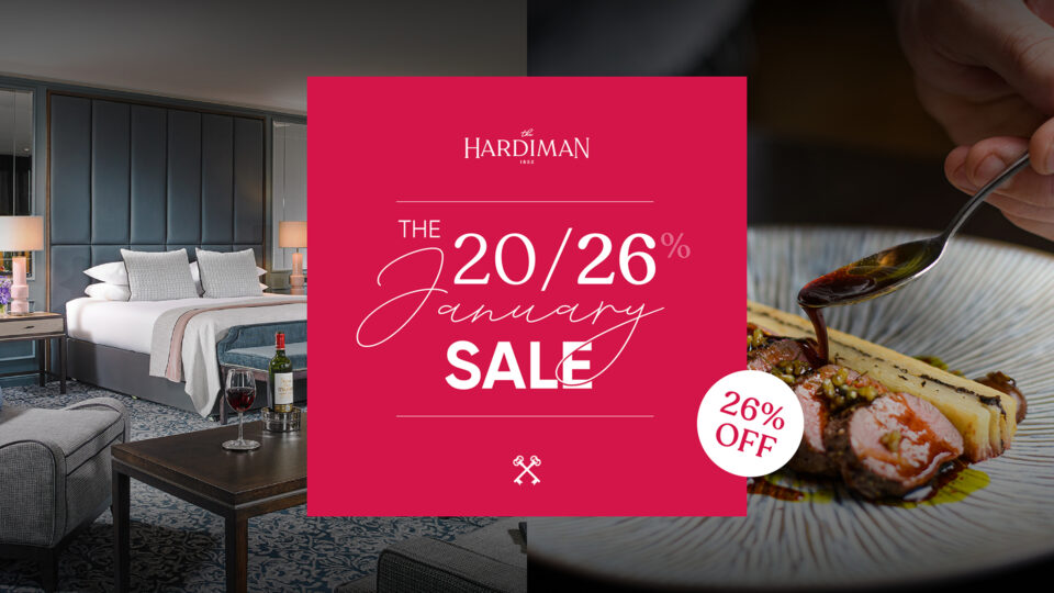 Promotional graphic for The Hardiman January Sale with 26% off, featuring a hotel room and a close-up of plated food.