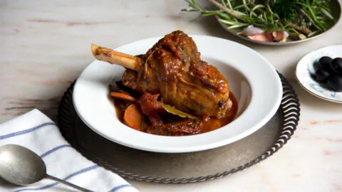 Savour tender braised lamb shank with herbs in our hotel's elegant dining restaurant, offering a delightful culinary experience.